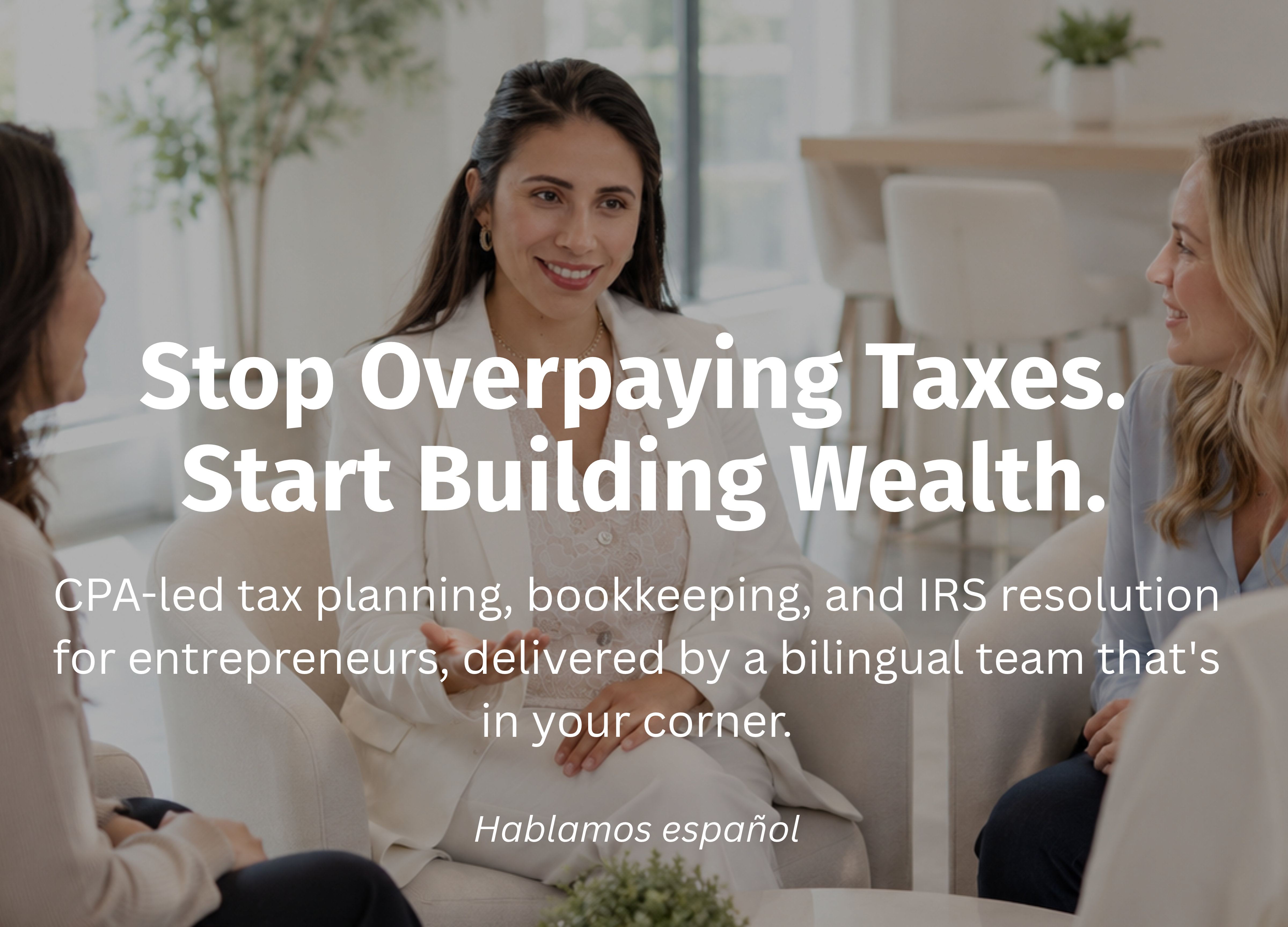 Laura Zarrate, CPA, meeting with clients — Stop Overpaying Taxes. Start Building Wealth.